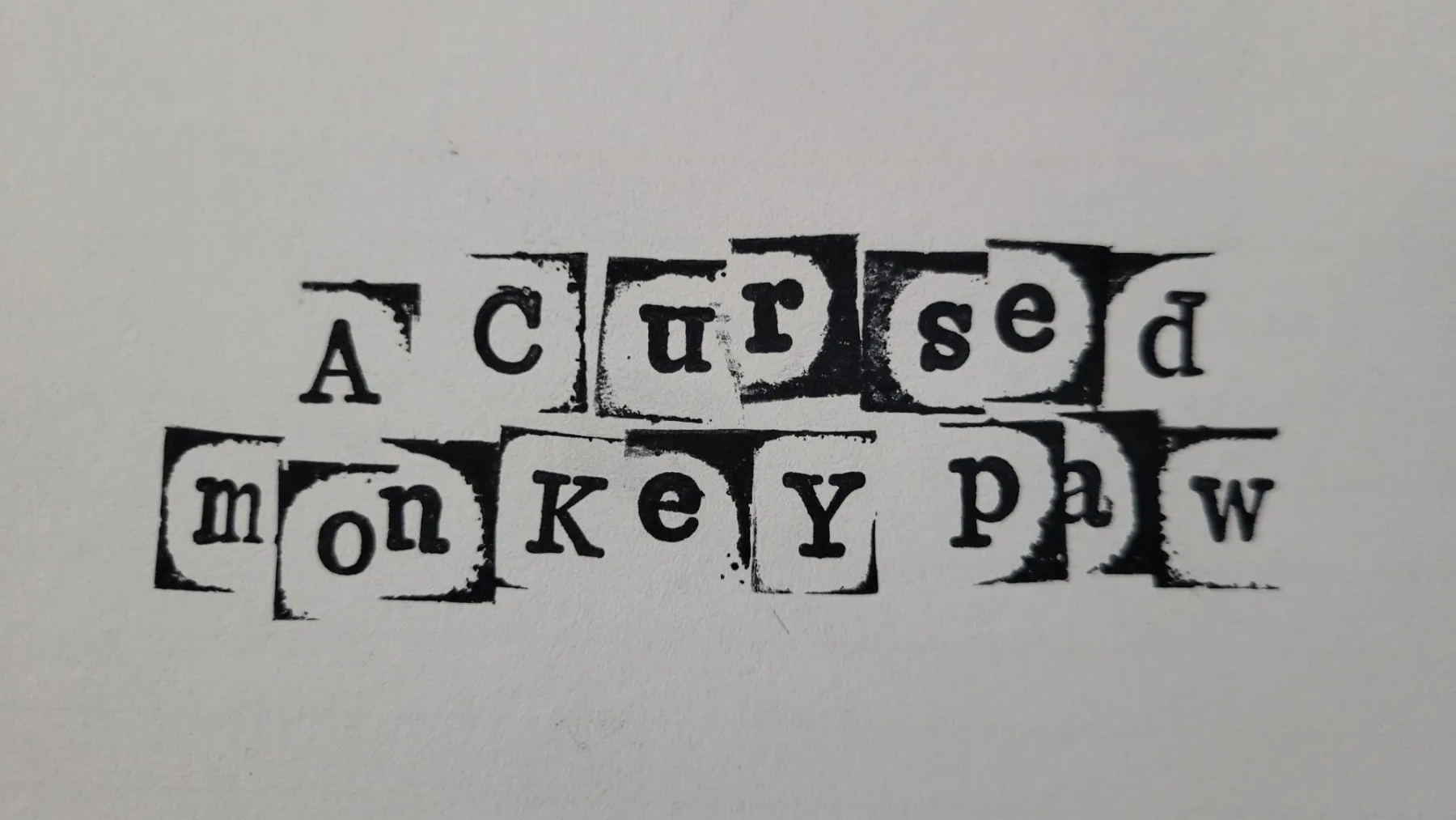 Physical Archive card for A cursed mokey paw